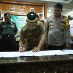 Jelang Pilkada Pemkab Lamtim Gelar Penandatanganan NPHD Dengan Polres Lamtim dan Kodim 0429 Lamtim